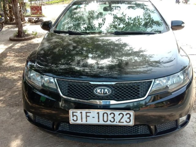 Cần bán Kia Forte 2010, màu đen xe gia đình