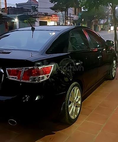 Bán ô tô Kia Cerato 1.6 sản xuất 2009, màu đen, xe nhập, số tự động