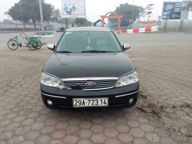 Cần bán gấp Ford Laser sản xuất 2004, màu đen xe gia đình, giá chỉ 160 triệu