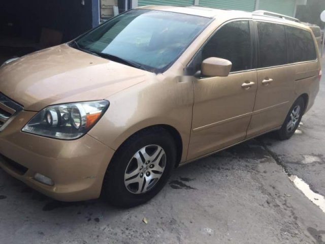 Cần bán lại xe Honda Odyssey đời 2005, màu vàng xe gia đình giá cạnh tranh