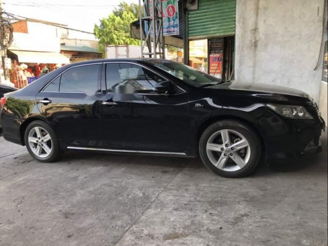 Cần bán gấp Toyota Camry 2.5 Q 2014, màu đen đẹp như mới, giá 910tr