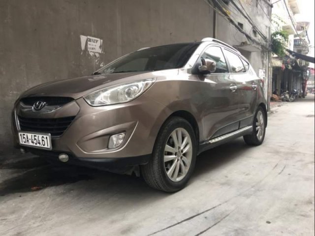 Bán xe Hyundai Tucson 2.0 AT 4WD năm sản xuất 2010, màu nâu, nhập khẩu chính chủ, giá tốt