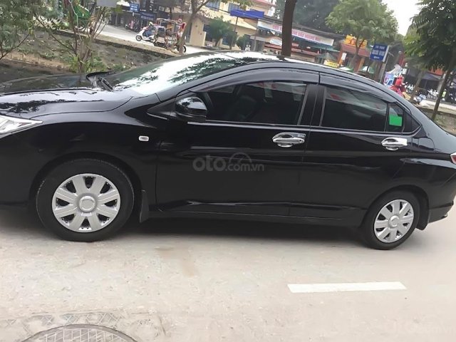 Cần bán gấp Honda City 1.5 MT năm sản xuất 2016, màu đen như mới, giá 450tr