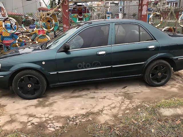 Cần bán Ford Laser đời 2003, màu xanh lục, xe gia đình, giá chỉ 150 triệu