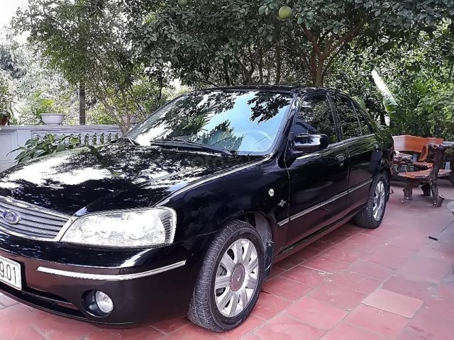 Cần bán lại xe cũ Ford Laser GHIA 1.8 AT đời 2005, màu đen  