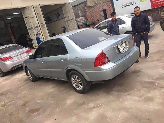 Cần bán lại xe Ford Laser LXi 1.6 MT năm 2004, màu bạc chính chủ 