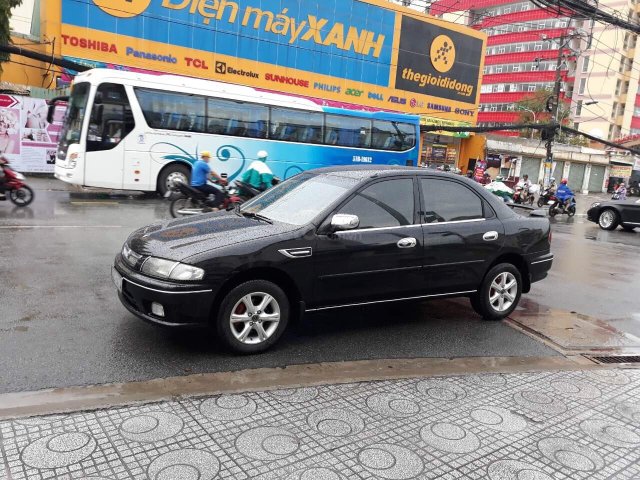 Bán Mazda 323 sx 2000, màu đen chính chủ