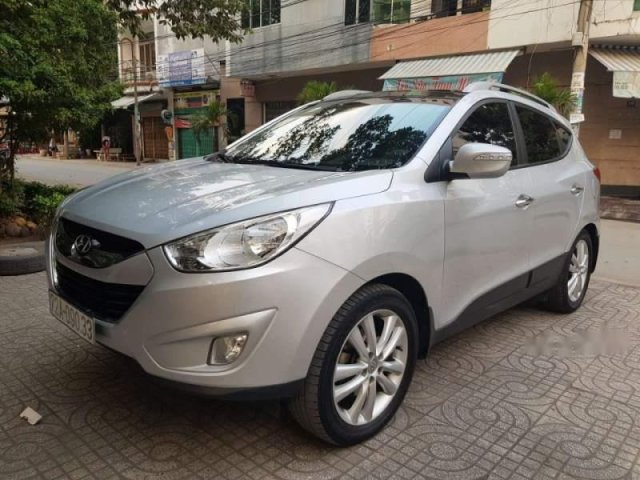 Cần bán lại xe Hyundai Tucson 2013, màu bạc, xe nhập0