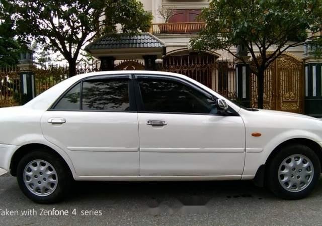 Cần bán lại xe Ford Laser 2005, màu trắng, nhập khẩu nguyên chiếc