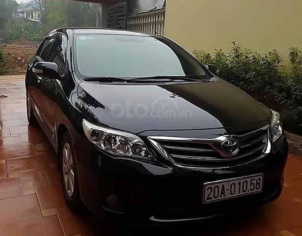 Cần bán gấp Toyota Corolla altis 1.8G MT 2011, màu đen chính chủ