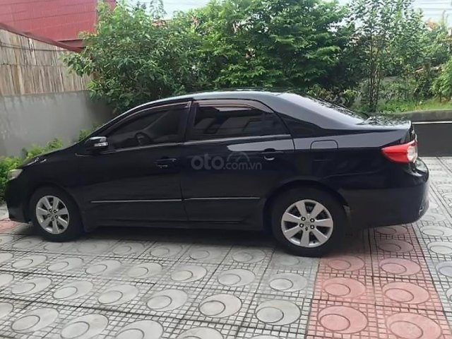 Cần bán lại xe Toyota Corolla altis 1.8G MT đời 2012, màu đen như mới 