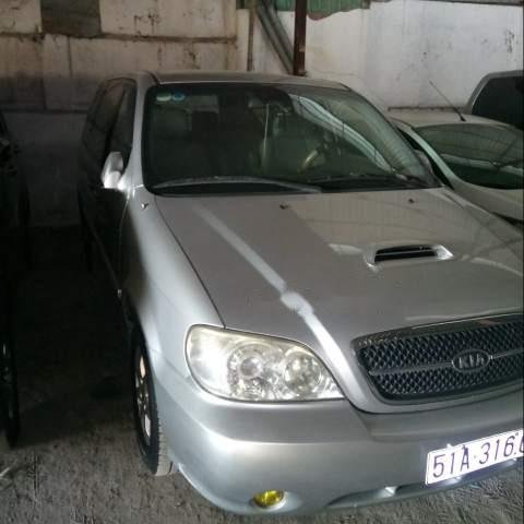 Cần bán xe Kia Carnival 2006, màu bạc, xe nhập  