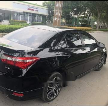 Bán xe cũ Toyota Corolla altis AT sản xuất năm 2014, màu đen