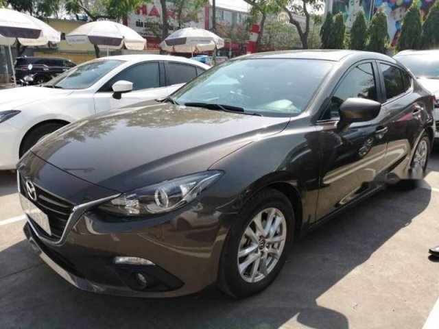 Bán ô tô Mazda 3 1.5 sản xuất 2015, màu nâu, nhập khẩu