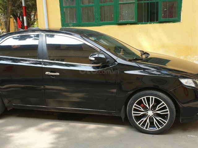 Bán Kia Forte SLi 1.6 AT đời 2009, màu đen, xe nhập, số tự động