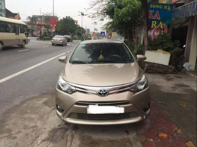 Cần bán xe Toyota Vios sản xuất 2015, màu vàng giá cạnh tranh