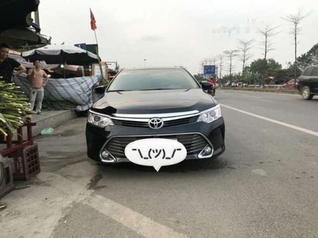 Bán Toyota Camry đời 2016, màu đen