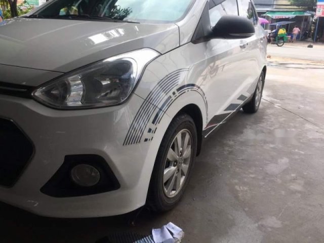 Cần bán lại xe Hyundai Grand i10 đời 2016, màu trắng, chính chủ0