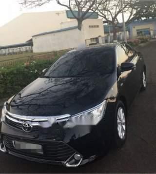 Bán Toyota Camry 2.0E đời 2016, màu đen chính chủ, 899tr