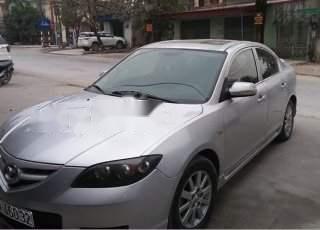 Cần bán Mazda 3 sản xuất 2009, màu bạc 
