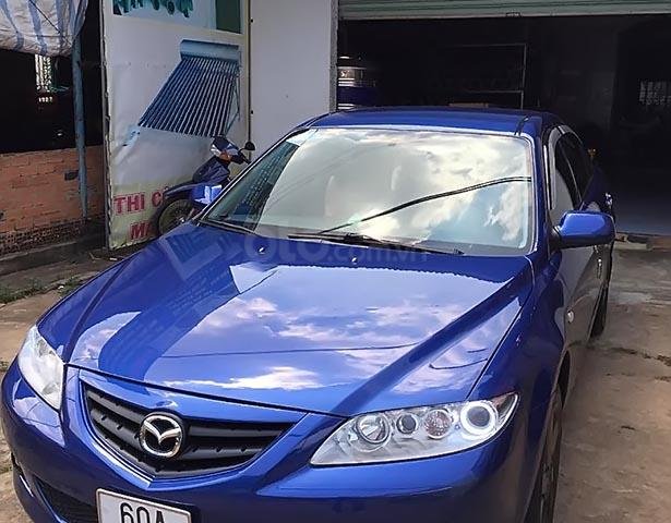 Bán xe Mazda 6 năm sản xuất 2003, màu xanh lam như mới 