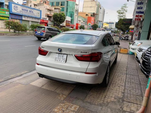 Cần bán gấp BMW 528 GT Series đăng ký lần đầu 2014, màu trắng xe nhập