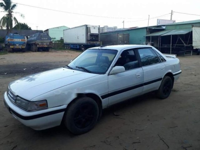 Bán Mazda 626 sản xuất năm 1995, màu trắng, xe nhập xe gia đình, giá 30tr0