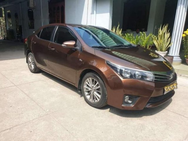 Bán ô tô Toyota Corolla Altis năm sản xuất 2014, màu nâu còn mới