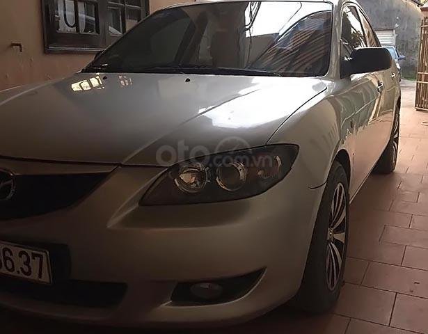 Cần bán Mazda 3 1.6 AT đời 2004, màu bạc, 270tr0