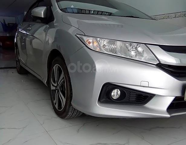 Cần bán lại xe Honda City năm 2016, màu bạc xe gia đình