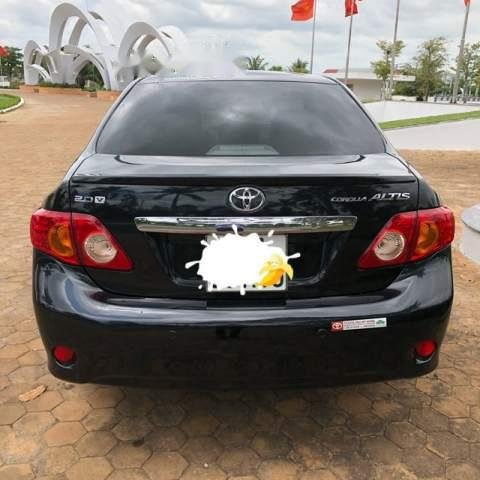 Cần bán gấp Toyota Corolla altis sản xuất 2009, màu đen số tự động giá cạnh tranh0