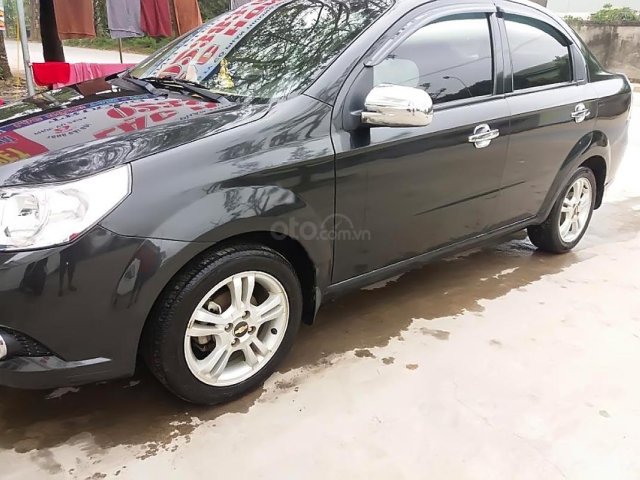 Cần bán Chevrolet Aveo LT 1.5 MT 2013, màu đen, giá tốt0