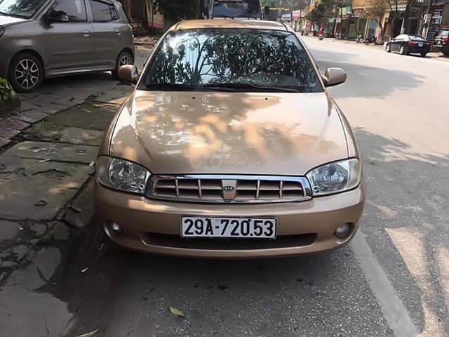 Bán Kia Spectra 1.6 MT sản xuất 2003, màu vàng, giá 155tr