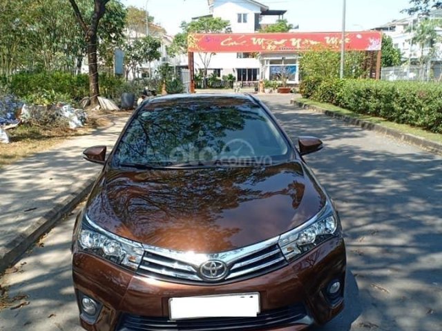 Bán xe Toyota Corolla Altis sản xuất 2015, màu nâu, xe nhà cần tiền bán gấp 630 triệu