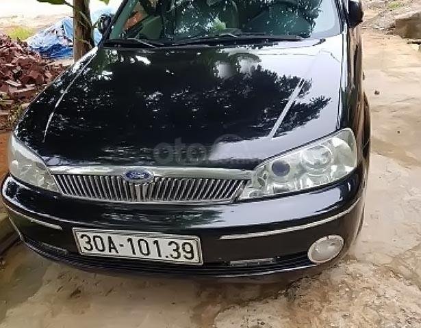 Bán Ford Laser 1.8 sản xuất năm 2003, màu đen, gầm bệ chắc chắn, điều hòa lạnh sâu