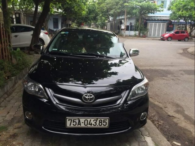 Cần bán Toyota Corolla altis sản xuất 2013, màu đen chính chủ