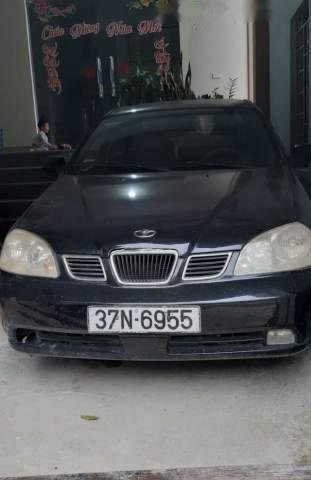 Bán xe Daewoo Lacetti 1.6MT 2004, màu đen