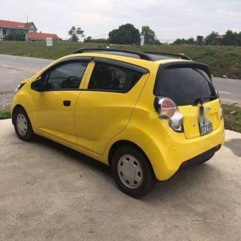 Bán Chevrolet Spark Van đời 2011, màu vàng, xe nhập, số tự động