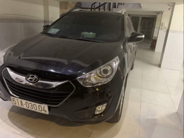 Cần bán xe Hyundai Tucson 4x4 đời 2010, màu đen, nhập khẩu Hàn Quốc số tự động