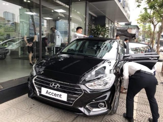 Cần bán Hyundai Accent 1.4AT năm 2019, màu đen, giá chỉ 540 triệu0