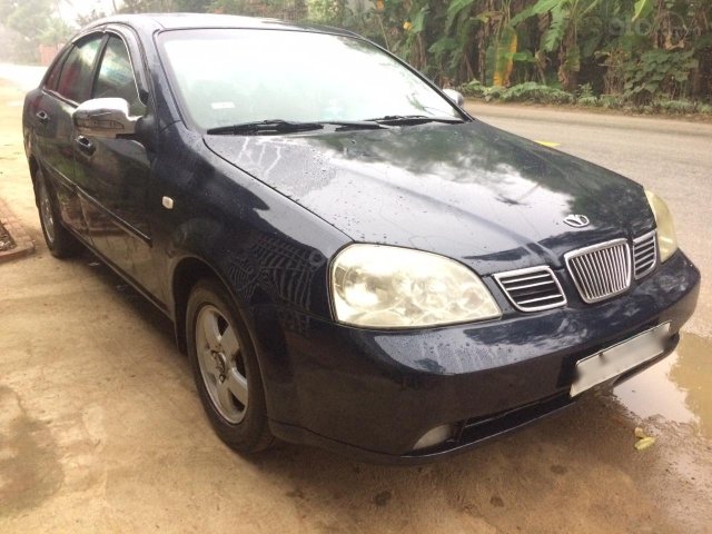 Cần bán gấp Daewoo Lacetti Ex đời 2004, màu xanh lục, 128 triệu