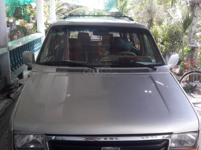 Cần bán gấp Dodge Caravan năm 1990, màu vàng, phun xăng điện tử0