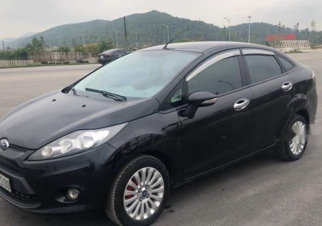 Cần bán xe Ford Fiesta 2011, màu đen số tự động, 310tr0