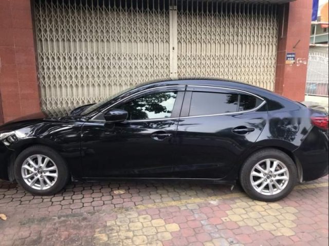 Cần bán lại xe Mazda 3 đời 2015, màu đen còn mới