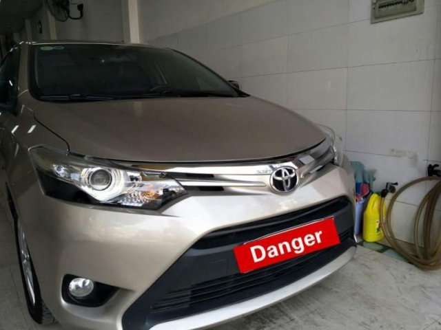 Bán Toyota Vios G 2015, màu vàng xe gia đình