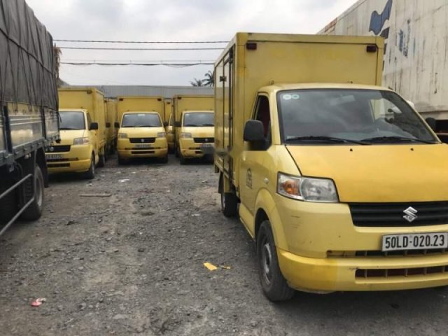 Cần bán gấp Suzuki Carry năm 2012, màu vàng0