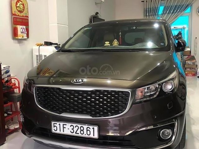 Gia đình bán Kia Sedona đời 2015, màu nâu