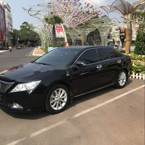 Cần bán xe Toyota Camry 2014, màu đen chính chủ0