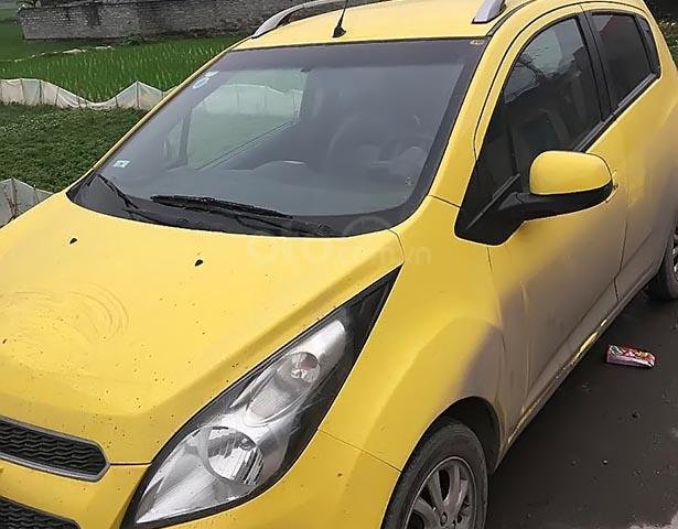 Cần bán lại xe Chevrolet Spark 1.0 đời 2014, màu vàng, xe nhập