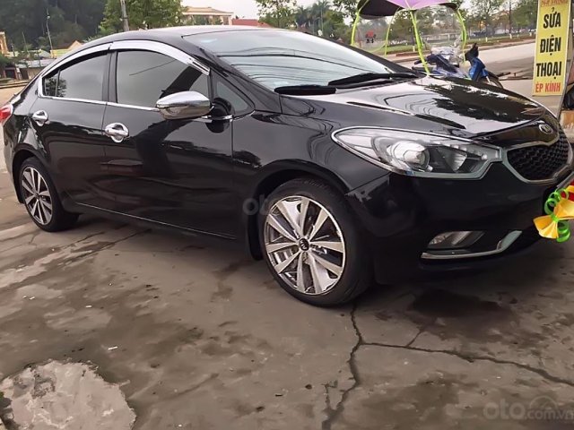 Cần bán xe Kia K3 năm sản xuất 2015, màu đen chính chủ0